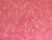 Pink fabric with leaf contour pattern.